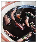 写真：海鮮料理お勧めナンバー３のイカスミ汁